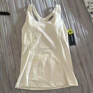 Cream high neck active tank with built in bra